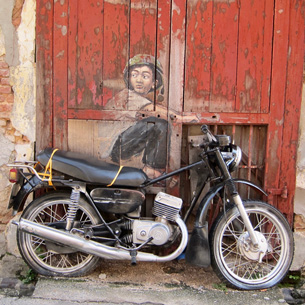 mural painting of boy riding motorcycle